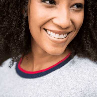 girl smiling with straight teeth